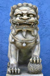 Second guardian lion carving, paired with the first